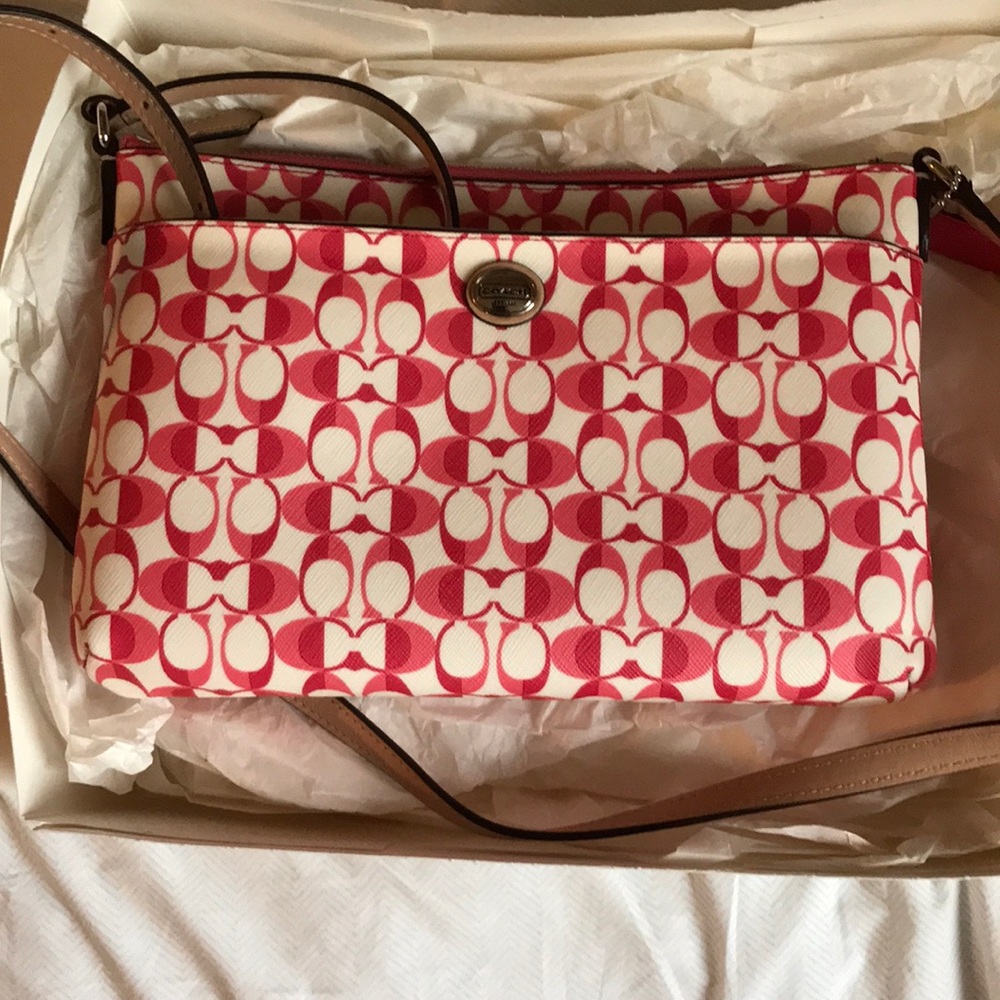 Brand new white pomegranate coach purse.